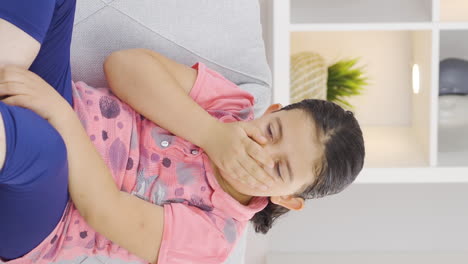 Vertical-video-of-Sick-girl-child-sneezing.